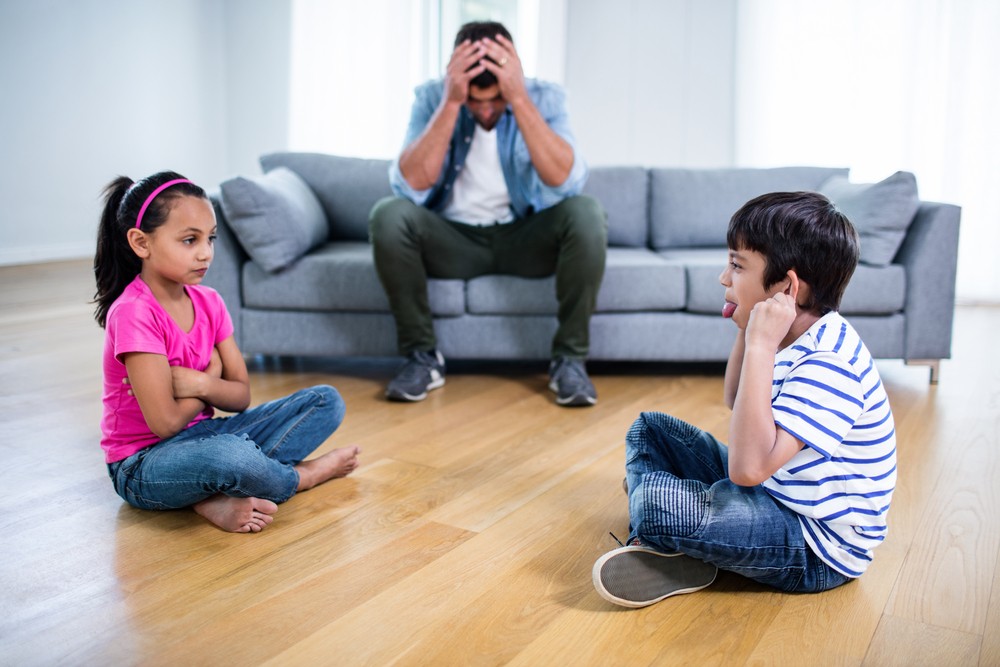 parents settling conflicts among siblings in the family
